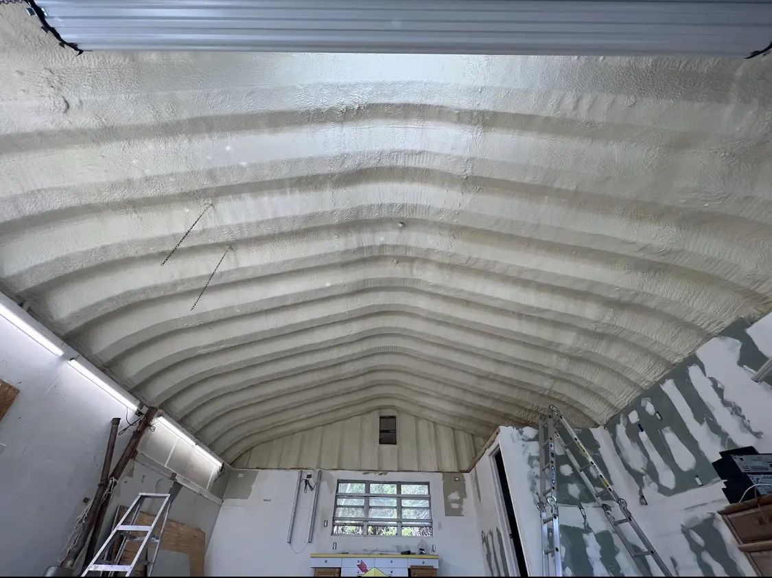Spray polyurethane foam applied to the underside of a metal roof deck in Lower Swatara